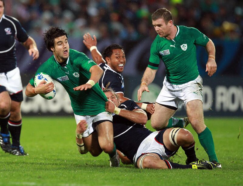 Ireland's Conor Murray tackled by Todd Clever of USA  during the 2011 Rugby World Cup game in New Plymouth. Photograph: Dan Sheridan/Inpho