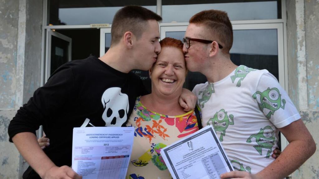 ‘Despite the flaws, I think the Leaving Cert has a lot going for it. It promotes solidarity. I can’t think of anything that pulls the generations together in the same way as the Leaving Cert.’ Above, Suzanne Doyle with her twin sons Nathan left and Jordan, who received their Leaving cert results from St John’s College Ballyfermot last year. Photograph: Brenda Fitzsimons/IRISH TIMES