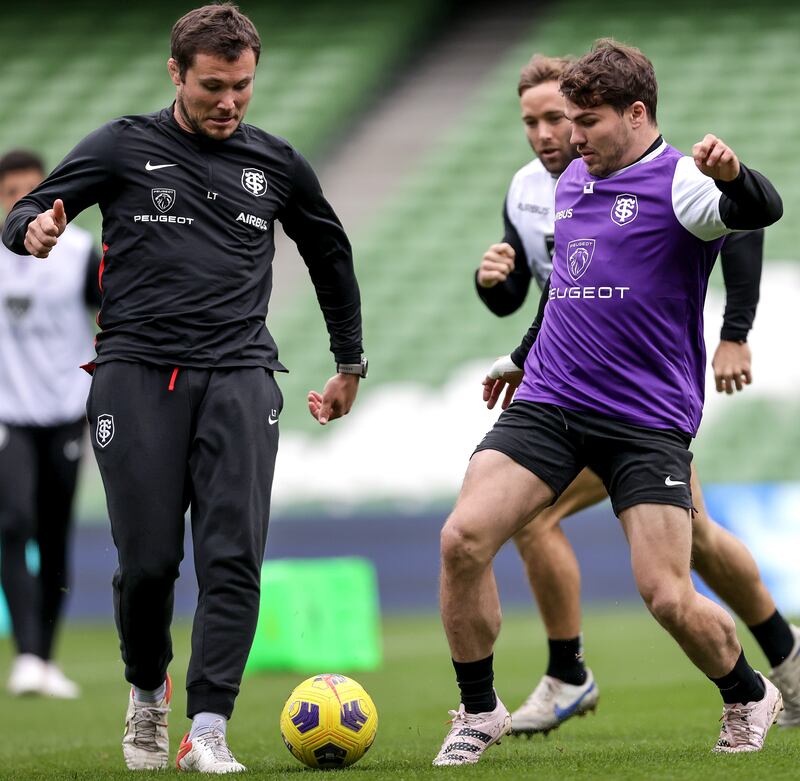 Toulouse's Paul Graou and Antoine Dupont playing football at thew Aviva Stadium during the captain's run. Photograph: Laszlo Geczo/Inpho                   