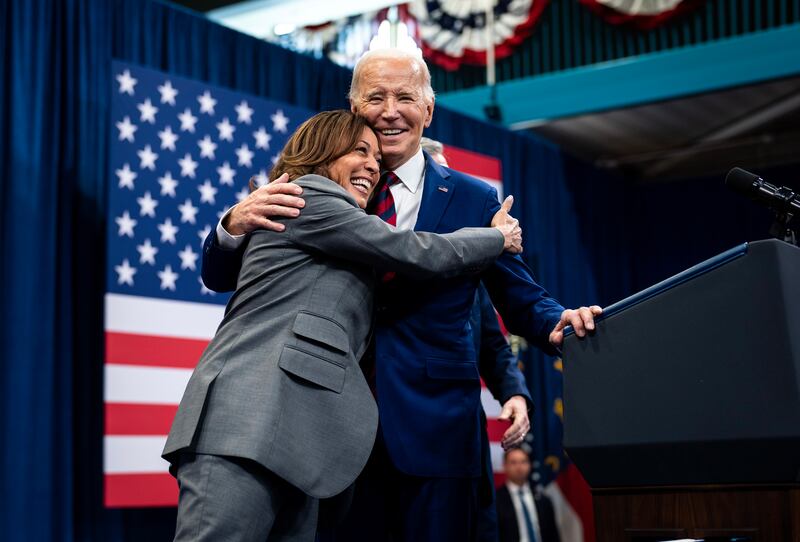 US president Joe Biden and vice-president Kamala Harris embrace following their remarks on 14th anniversary of the Affordable Care Act in 2024. Photograph: Doug Mills/New York Times
                      