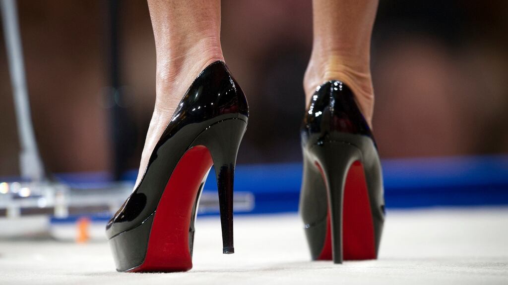 Christian Louboutin shoes with their distincive red soles.  Photograph: Cliff Owen/AP
