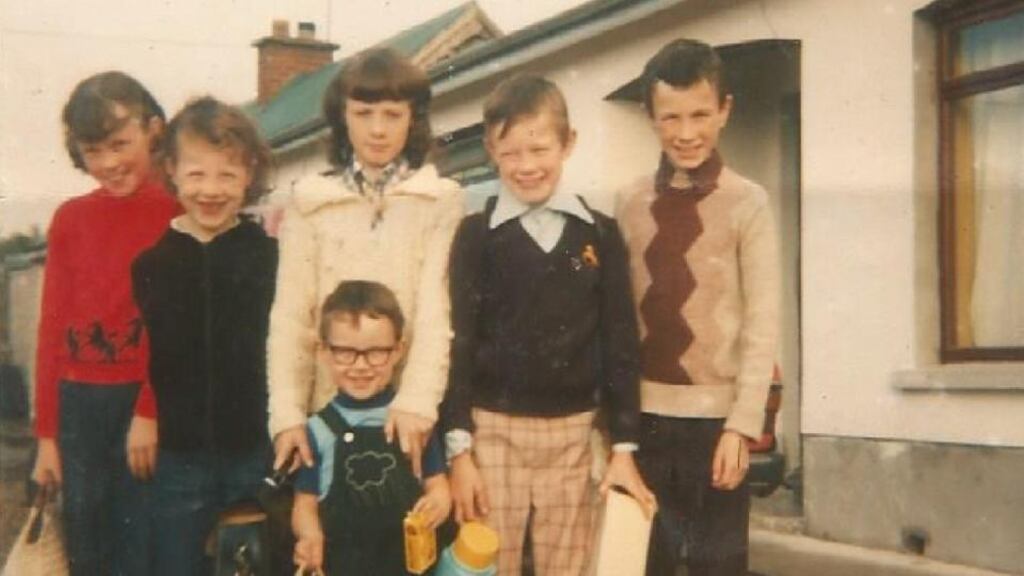Anthony J Quinn and his siblings as children. Quinn is the tallest of the boys(far right), followed by Jim, and then Paul, who both feature in the essay