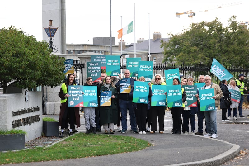 Fórsa staff and AHCPS picket outside Garda HQ, in the Phoenix Park, Dublin.
Photograph: Dara Mac Dónaill / The Irish Times