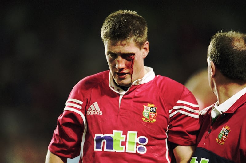 Ronan O'Gara of the British Lions leaves the field bleeding after an assault by Duncan McRae of the Waratahs during the Lions Tour to Australia 2001. Photograph: Dave Rogers /Allsport