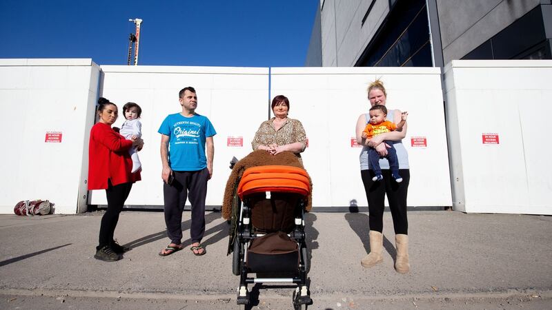 Local residents Samantha Johnston with  son Jayden (1), Osman Kianizadeh, Eileen McDonnell and Michelle Corrigan with her son Kian (8 months), protesting outside a Townsend Street John Paul building site in Dublin on Tuesday. Photograph: Tom Honan/The Irish Times