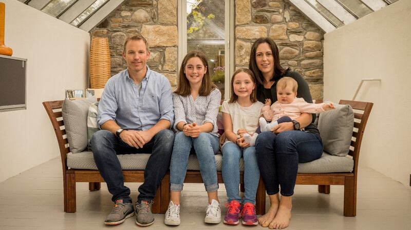 Former rowers Eoghan and Helen Hannigan with their children Medb, Caelfind, and Abaigeal.