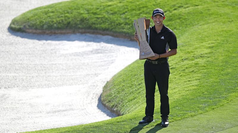 Collin Morikawa of the United States poses with the trophy after winning  the Barracuda Championship at Montreux Country Club  in Reno, Nevada. Photograph: Marianna Massey/Getty Images