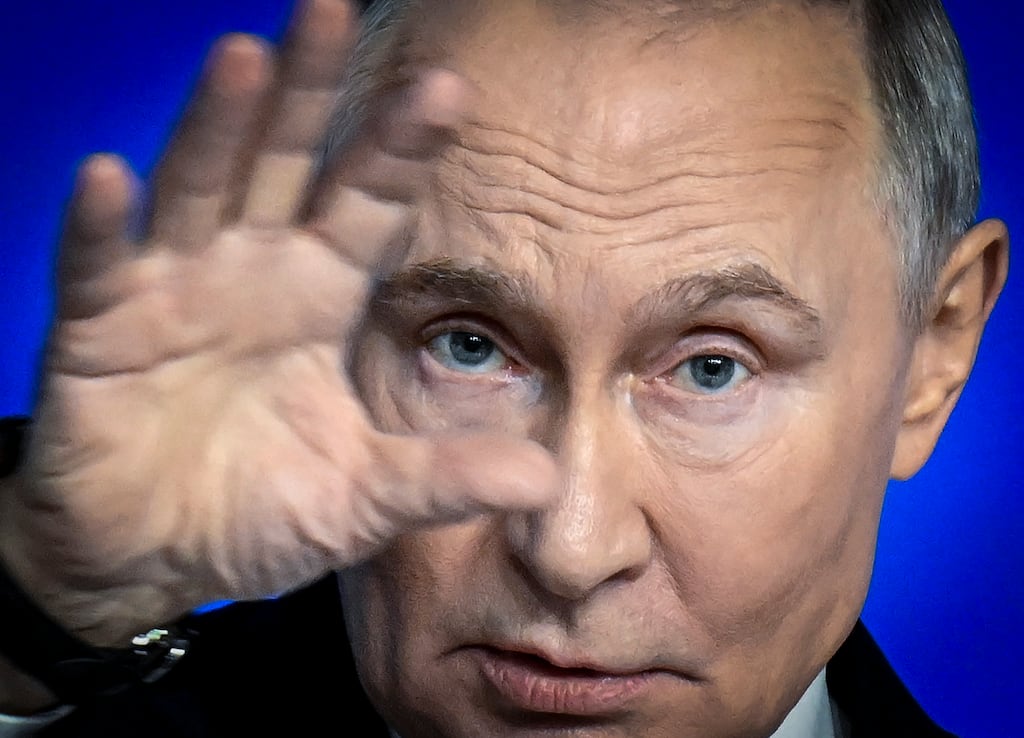 Russia's president Vladimir Putin during his annual end-of-year press conference in Moscow on Friday. Photograph: Alexander Nemenov/AFP/Getty Images