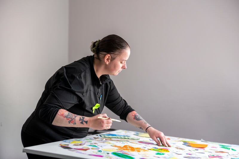 Susan Reynolds, who now acts as a peer-support volunteer with the housing charity Hail, facilitating an art workshop at the 
Carmelite Community Centre, Aungier Street, Dublin. Photograph: Tom Honan
