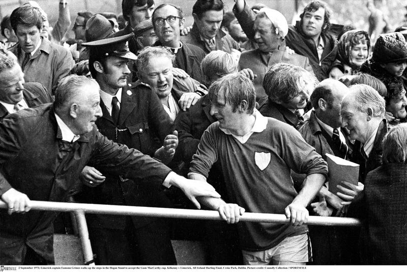 Eamonn Grimes walks up the steps in the Hogan Stand to accept the Liam MacCarthy cup in September 1973 after Limerick's victory over Kilkenny. Photograph: Connolly Collection/Sportsfile 