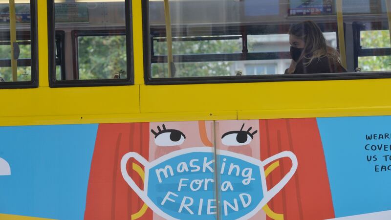A passenger  wears a mask on a bus in Dublin city centre. Photograph: Alan Betson