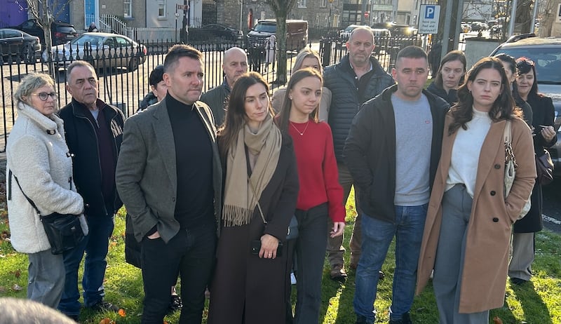 Angela Cunningham's family members pictured outside court, including daughter  Louise (front, second from left) and son Paul (front, second from right)