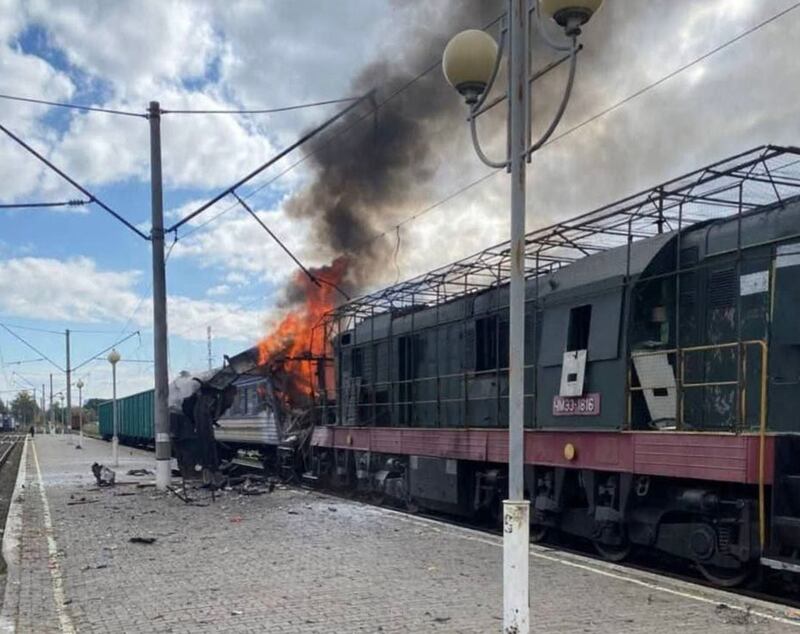 A Ukrainian passenger train engulfed in flames after a Russian attack. Photograph: Ukrainian Railway/AP