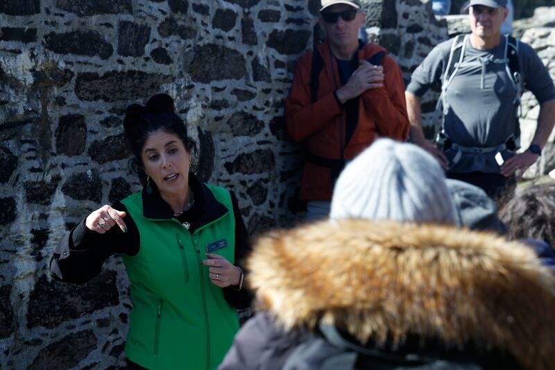 Maggie Keane, the OPW's supervisor guide, speaking to tourists on Skellig Michael on Saturday. She says visitors come to the Skellig for different reasons but leave 'with a different perspective'. Photograph: Nick Bradshaw/The Irish Times