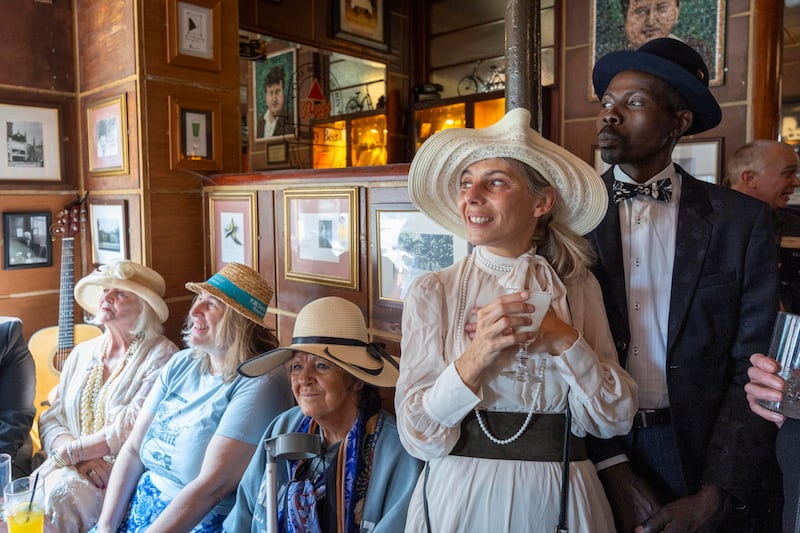 Lisa Tonello from Italy and Issa Ali from Dublin celebrate Bloomsday in Kennedy’s, Westland Row, Dublin. Photograph: Tom Honan/The Irish Times