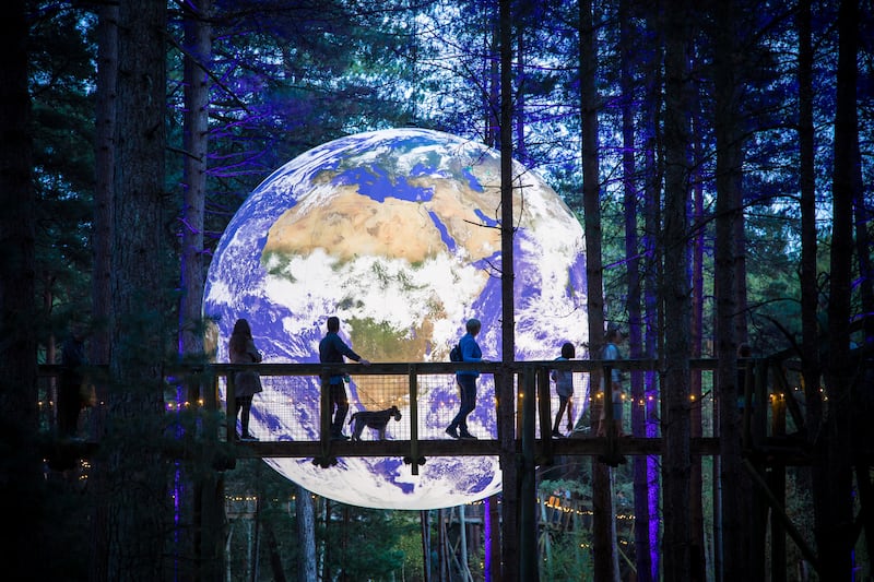 Gaia by Luke Jerram at Moors Valley Country Park, Ringwood: `They’ll come in and take a load of photos. But then they’ll sit and contemplate and watch other people, and talk to one another about what they’re seeing.' Photograph: Roy Riley
