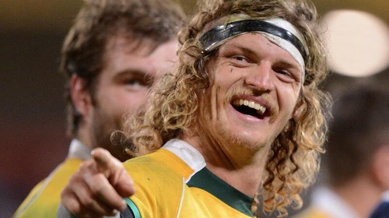 Australia’s   Nick Cummins celebrates after the final whistle at Suncorp Stadium in Brisbane. Photograph: Dave Hunt / EPA