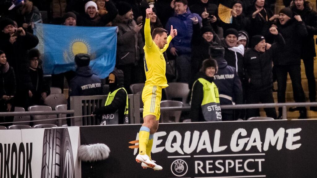 Astana’s Dmitri Shomko celebrates scoring his goal against Manchester United. Photograph: Ash Donelon/Manchester United via Getty Images