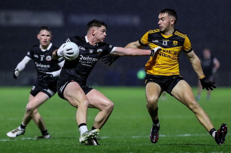 Kilcoo's Anthony Morgan and Loughmacrory's Pauraic Meenagh. Photograph: Lorcan Doherty/Inpho