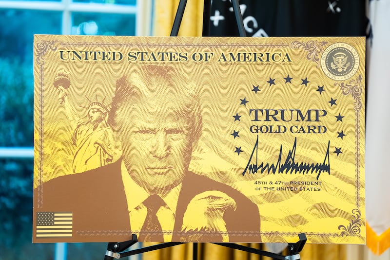 The ‘Trump Gold Card’ on display in the Oval Office at the White House. Photograph: Demetrius Freeman/Washington Post/Getty Images