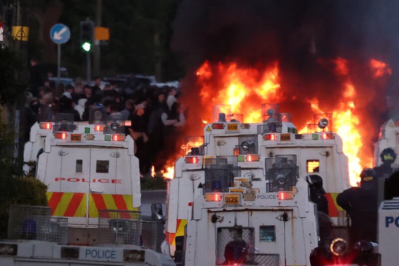 The scenes as police clash with crowds of agitators on the Antrim Road, near the Sandyknowes roundabout in Newtownabbey. Photo credit should read: PA/PA Wire