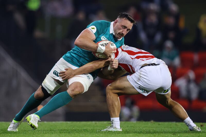 Japan's Harry Hocking tackles Ireland's Jack Conan. Photograph: Ben Brady/Inpho