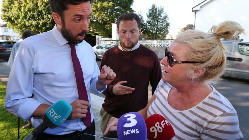 Minister for Local Government Eoghan Murphy speaks with Angela Quinn, a resident of Stameen Estate, Drogheda, which has been struck by water shortages. Photograph: Colin Keegan, Collins Dublin