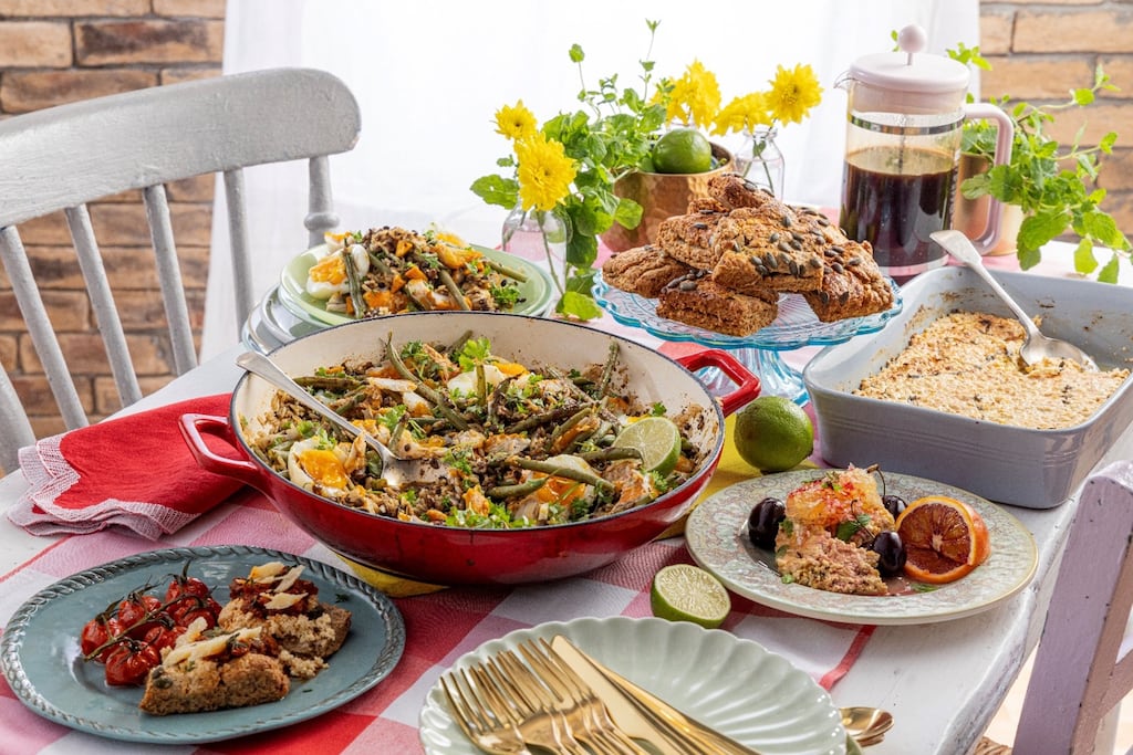 Create a spread that fills the table with plates and cutlery stacked in one corner so guest can help themselves and go back for more