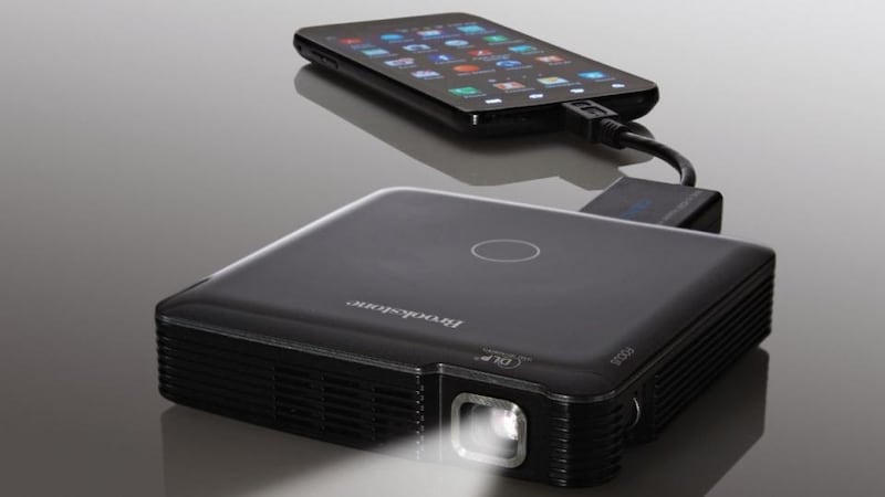 Brookstone’s travel projector is portable and virtually pocketable