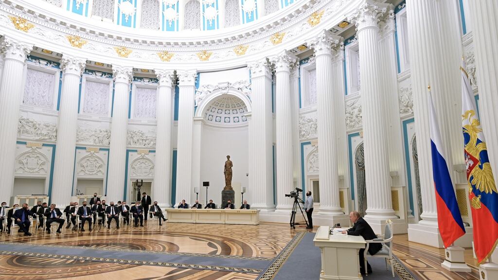 Russian President Vladimir Putin (R) chairs a meeting with Russian businessmen at the Kremlin in Moscow, Russia, 24 February 2022. EPA/ALEKSEY NIKOLSKYI/SPUTNIK/KREMLIN / POOL