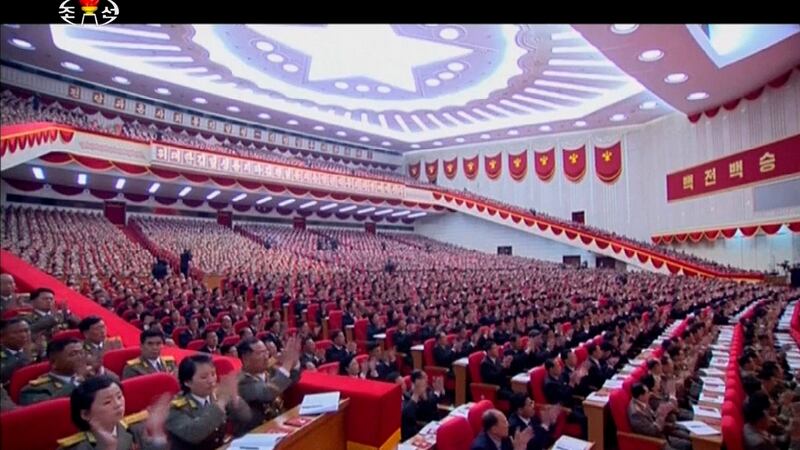 In this image made from video by North Korean broadcaster KRT, military officers and delagates applaud as North Korean leader Kim Jong Un gives speech at the party congress in Pyongyang, North Korea. Photograph: AP
