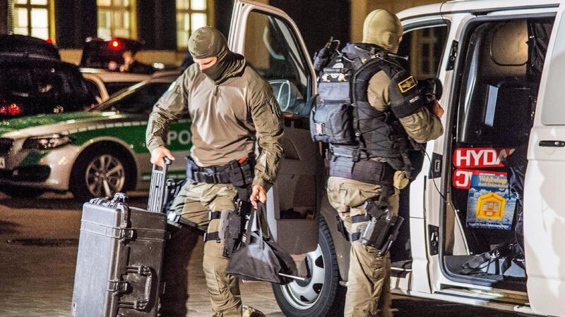 Specialist police officers arrive at the scene after an explosion occurred in Ansbach, Germany on Monday. Photograph: AP