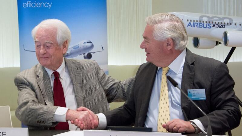 A320neo: Bill Franke of Indigo Partners LLC and John Leahy of Airbus shake on their preliminary deal in Dubai