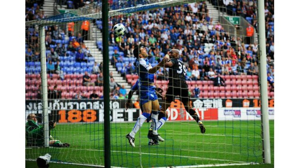 Nicolas Anelka heads his second and Chelsea's third on their way to a 6-0 win over Wigan Athletic at the DW Stadium. - (Photograph: Getty Images)
