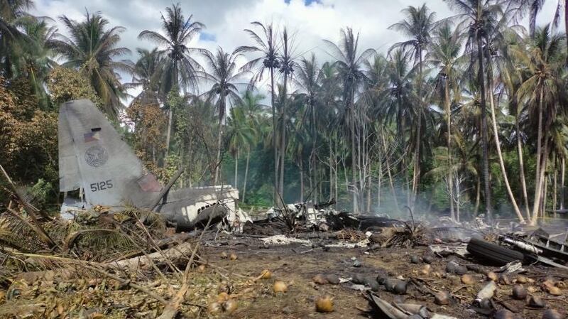 Debris from the crashed Air Force C-130 cargo plane. Photograph: Joint Task Force Jolo-Armed Forces/EPA