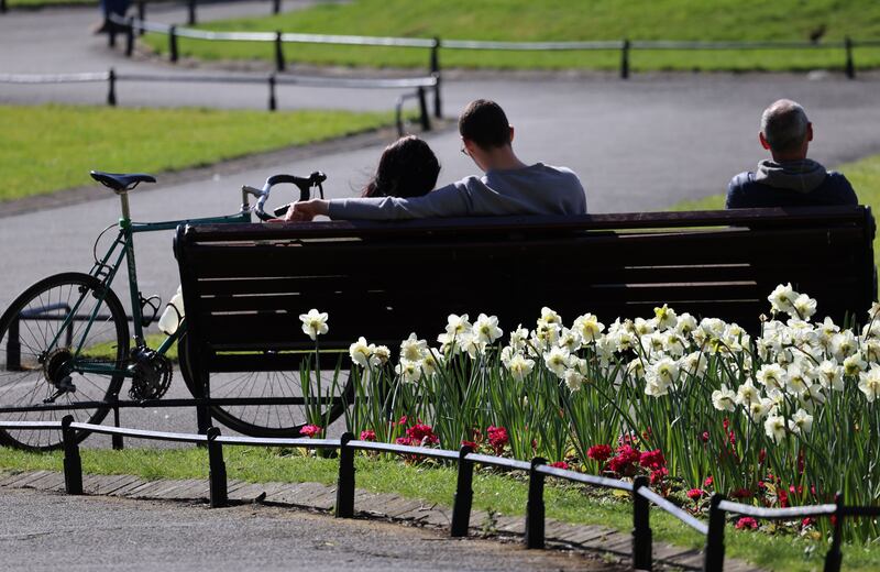 People enjoying the sunshine in Dublin's St Stephen's Green on Sunday. The pleasant weather is set to continue this week. Photograph: Dara Mac Dónaill