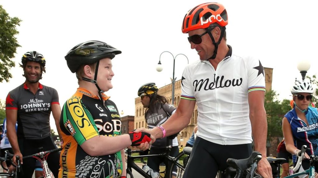 Lance Armstrong posed for photographs with fans prior to the start of the third day of the RAGBRAI en route to West Des Moines on Monday. Photograph: Matthew Stockman/Getty Images