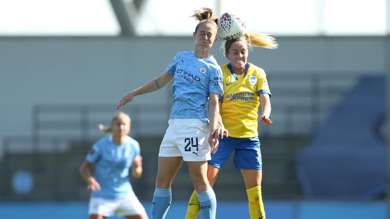 Keira Walsh of Manchester City wins a header over Denise O’Sullivan of Brighton and Hove Albion during the FA Women’s Super League match at Manchester City Football Academy on September 13th. Photograph:  Charlotte Tattersall/Getty Images
