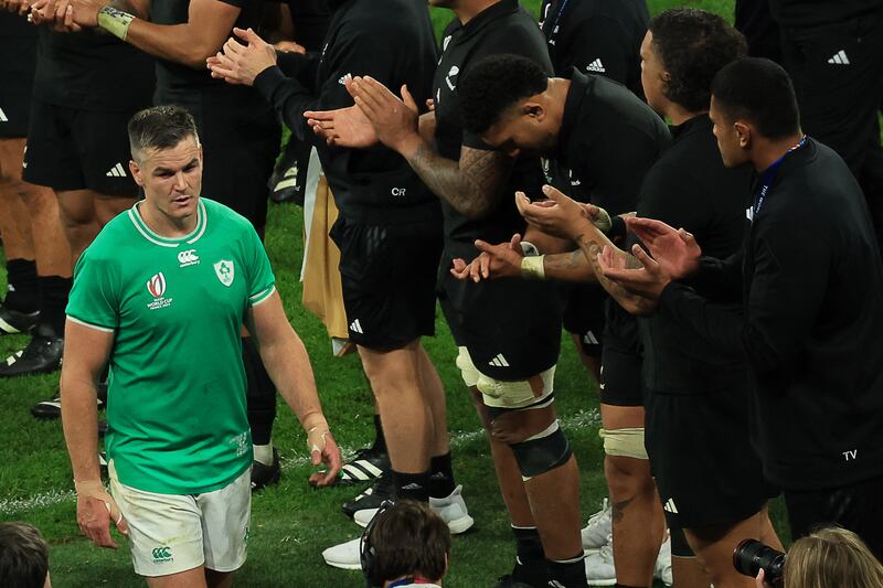 New Zealand's players applaud as Ireland's outhalf Jonathan Sexton leaves the pitch. Photograph: Emmanuel Dunand/AFP via Getty