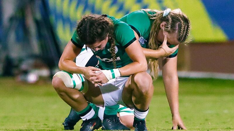 Dejected Irish players at the final whistle in Parma after Scotland secured a late win the Rugby World Cup European Qualifying Tournament. Photograph: Matteo Ciambelli/Inpho