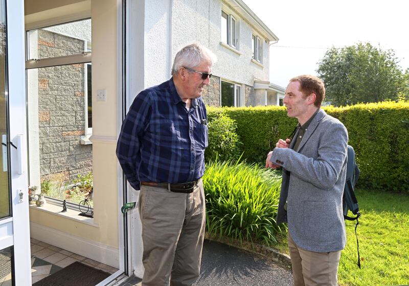 Green Party councillor Niall Murphy speaks to John O’Dwyer during a canvass in Salthill, Galway. Photograph: Joe O’Shaughnessy