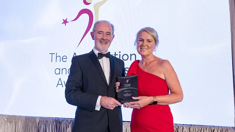 Sean Quigley, awards judge, presents the CEO of the year award to Susan Treacy, HealthTech Ireland