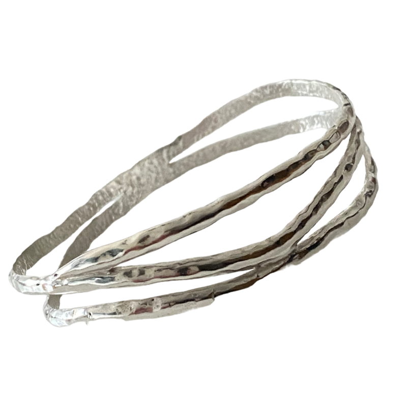 Three strand hallmarked solid silver bracelet by Martina Hamilton, €200