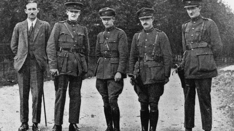 Michael Collins, Sinn Féin leader and commander-in-chief of the Irish Free State Army,  at the Curragh Barracks in Co Kildare in July 1922, with Col Dunphy, Maj Gen Emmet Dalton, Comdt Gen P MacMahon and Comdt Gen D O’Hegarty. Photograph: Finnerty/Hulton Archive/Getty Images