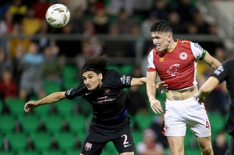 Sabah's Amin Seydiyev and Joe Redmond of St Patrick's Athletic in action during the first leg at Tallaght Stadium. Photograph: Laszlo Geczo/Inpho 