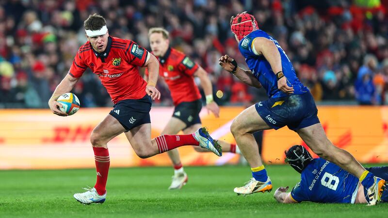Munster's Tom Farrell breaks away from Leinster's Caelan Doris at Thomond Park, Limerick, on December 27th, 2025. Photograph: Andrew Conan/Inpho