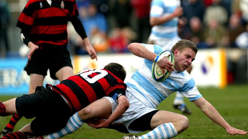 Kilkenny’s Craig Ronaldson tackles Ian Madigan of Blackrock in the 2007 Leinster Senior Cup . Photo: James Crombie/Inpho