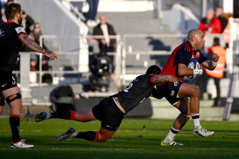 Simon Zebo carries for Munster. Christophe Simon/AFP via Getty Images