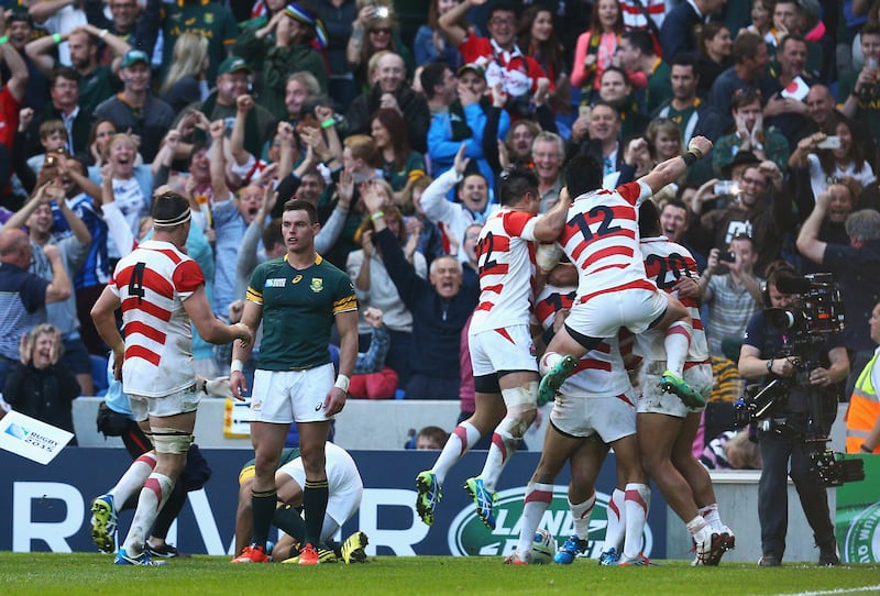 Japan celebrate their sensational victory over South Africa at the 2015 Rugby World Cup. Photograph: Charlie Crowhurst/Getty Images