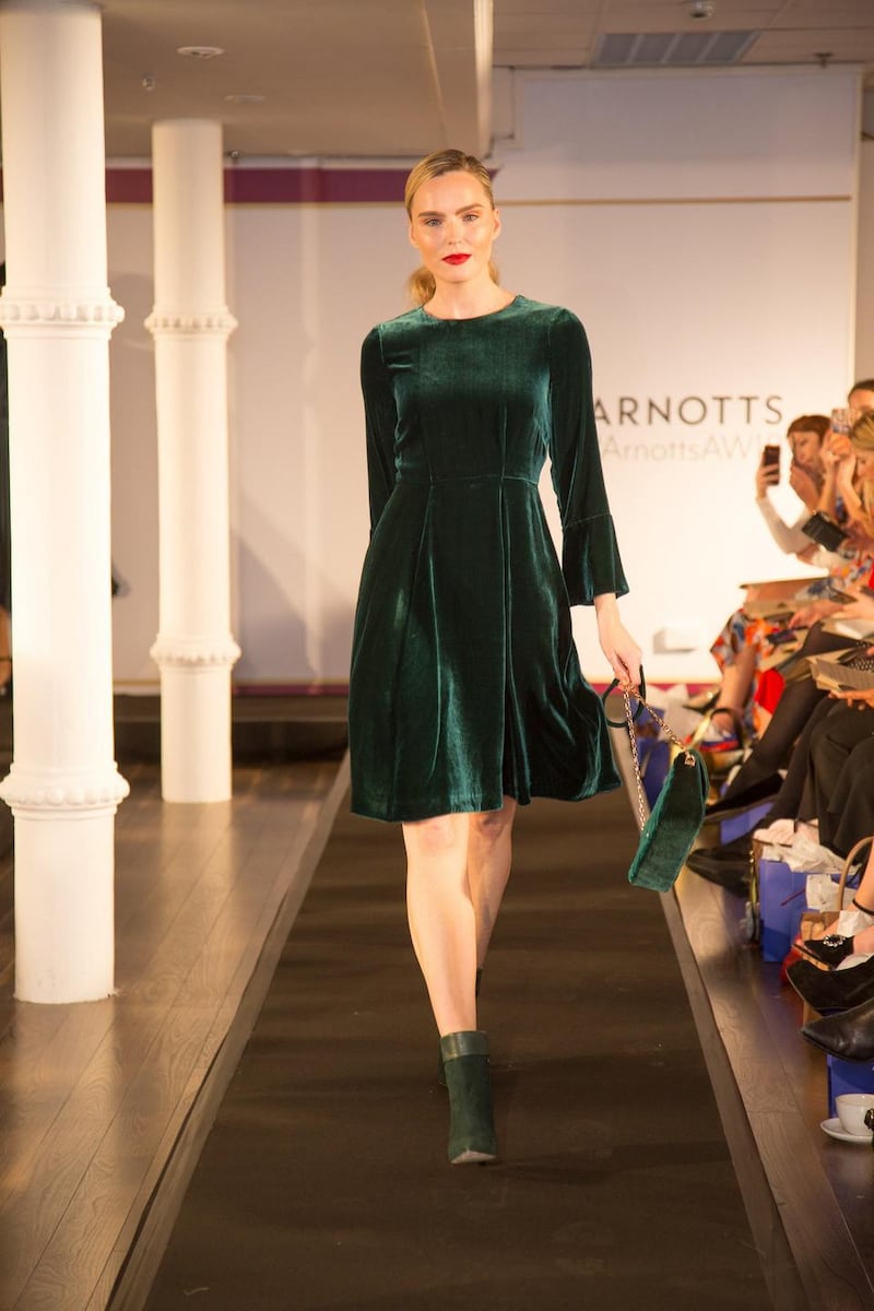 Green velvet dress, Hobbs, €240; Green velvet bag, Olga Berg, €76; Boots, Jonak, €160